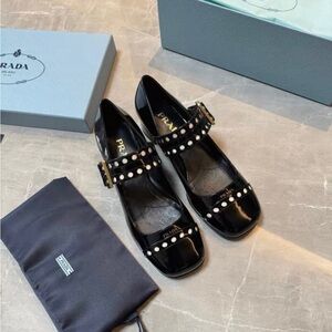 Prada Women's Black Patent Leather Flats with Studded Straps
